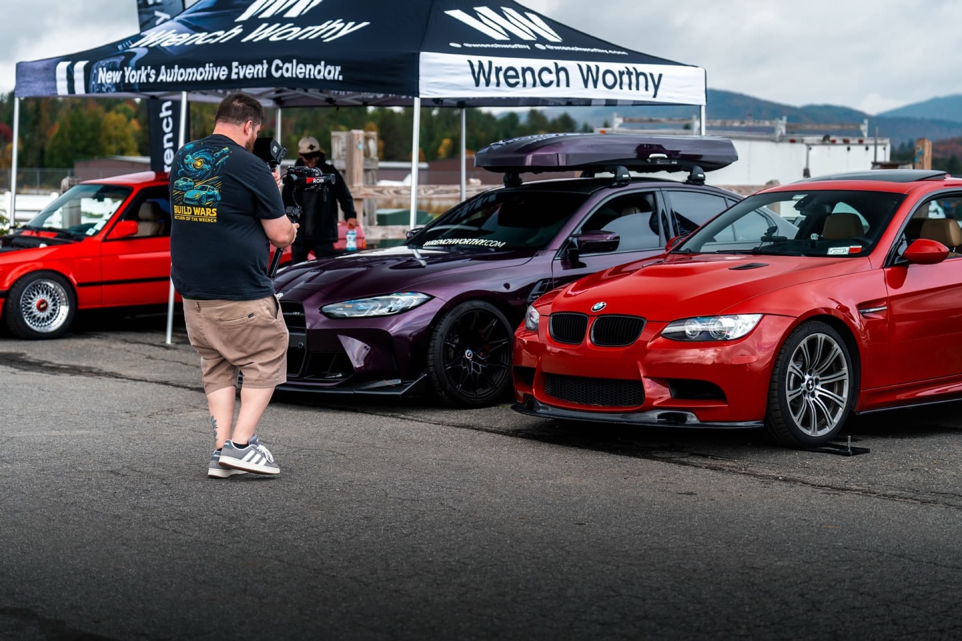 Purple BMW parked under moody lighting